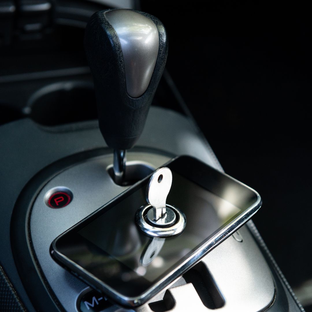 A phone with a key on top signifying it is locked