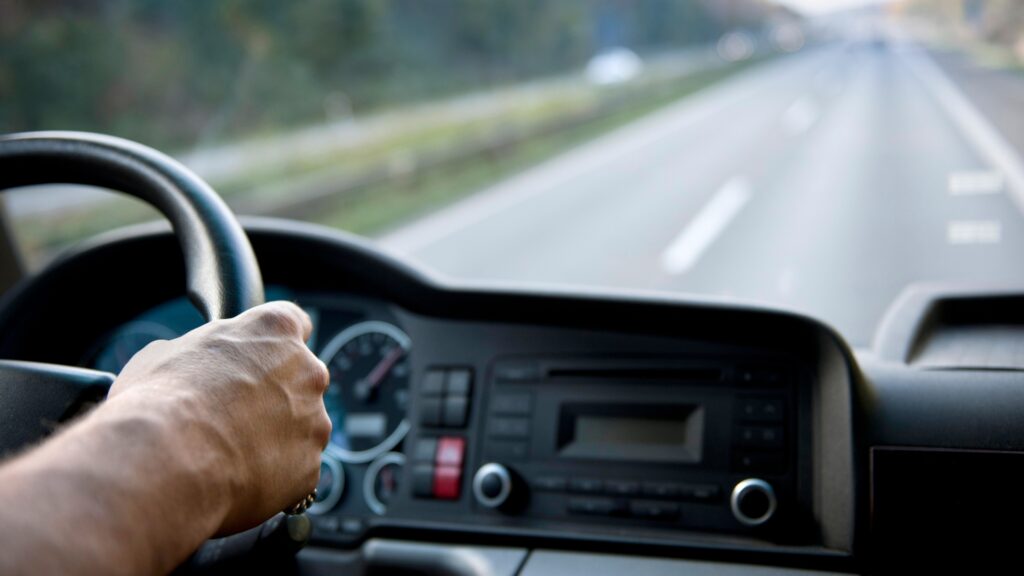 Hands on a steering wheel