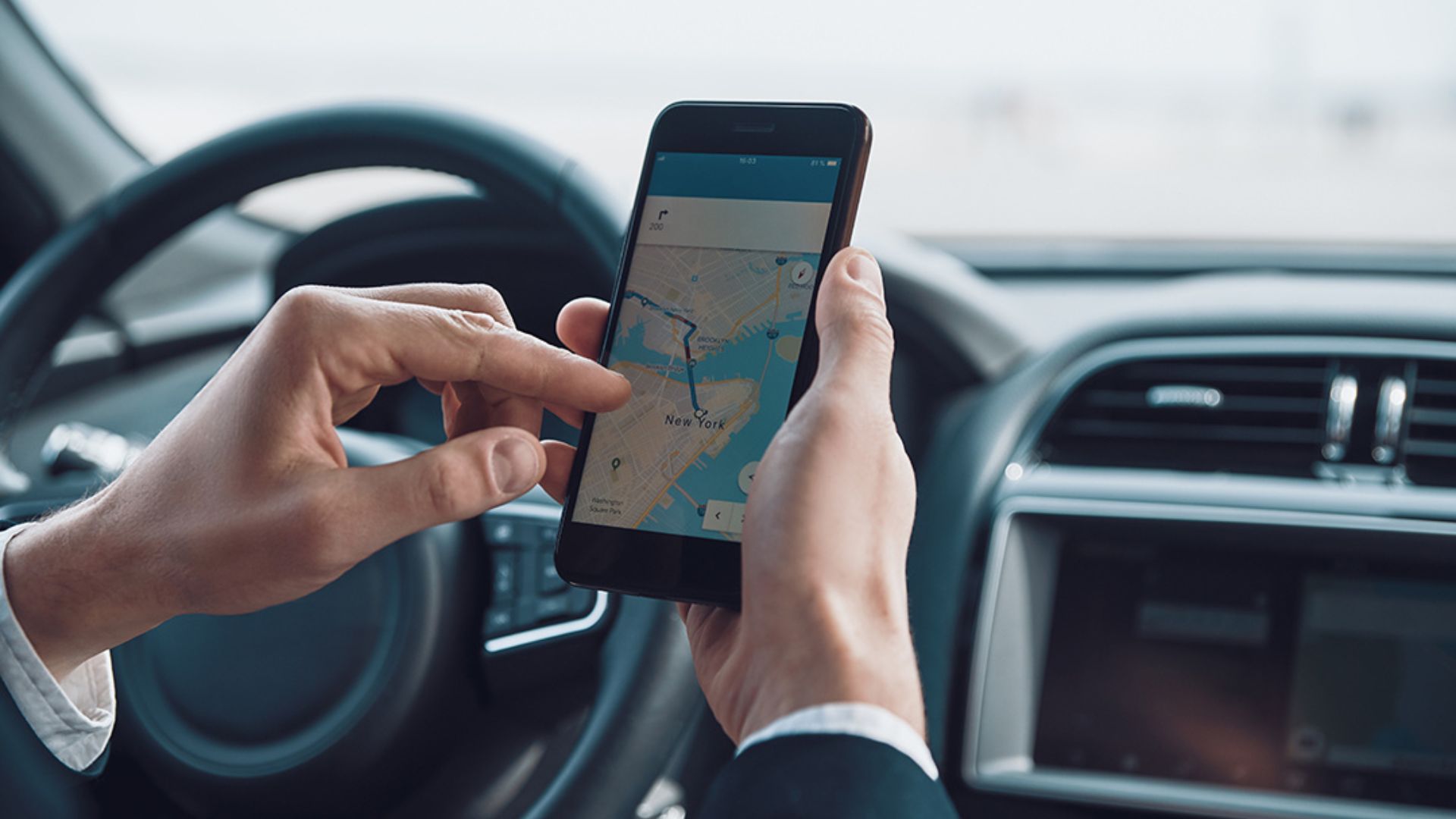 A business person using maps for directions