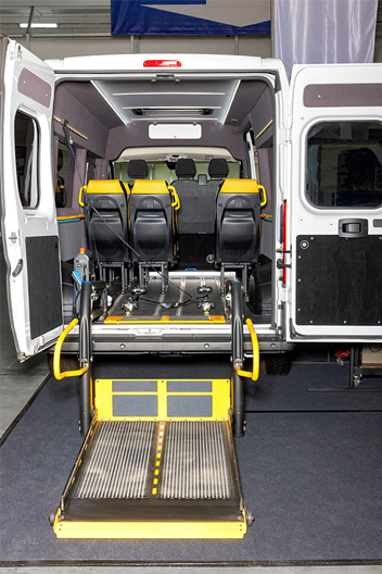 A van fitted with a deployable lift for handicapped people