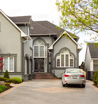 Sedean for business owner and sales in a homes driveway