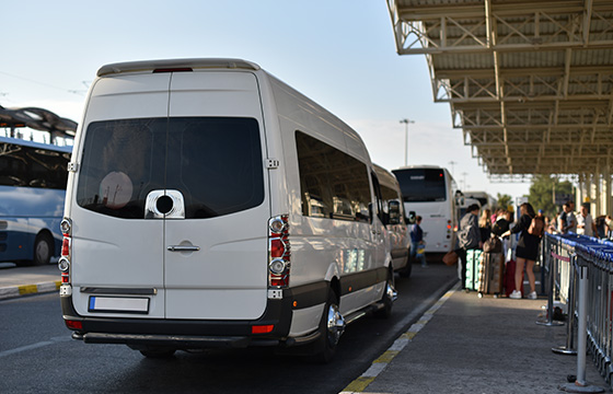 Shuttle bus waiting to pick people up at the airport for transportation