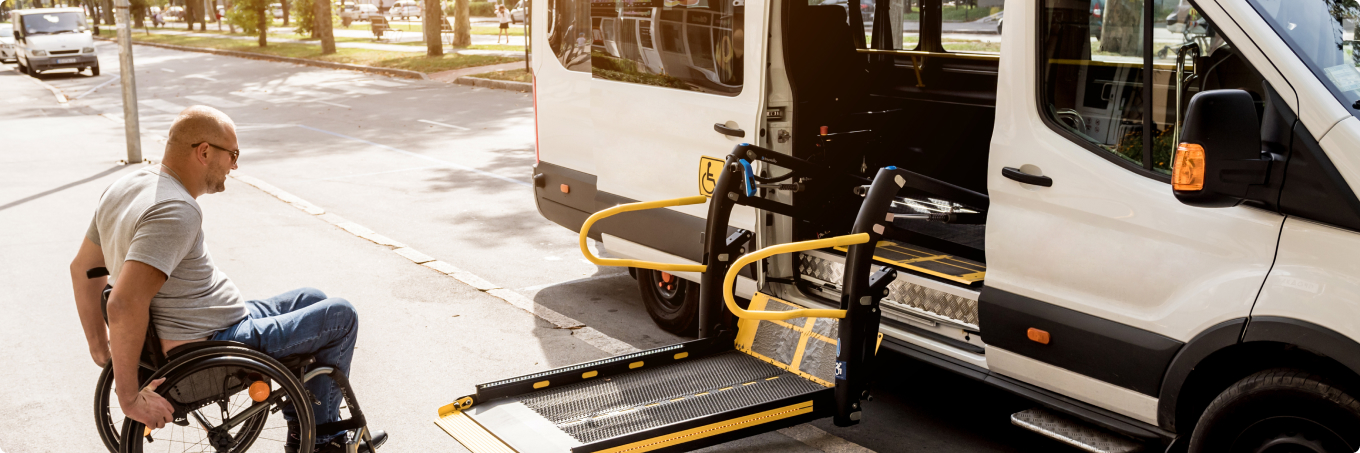 Man in a wheelchair approaching a life on an upfitted sprinter van
